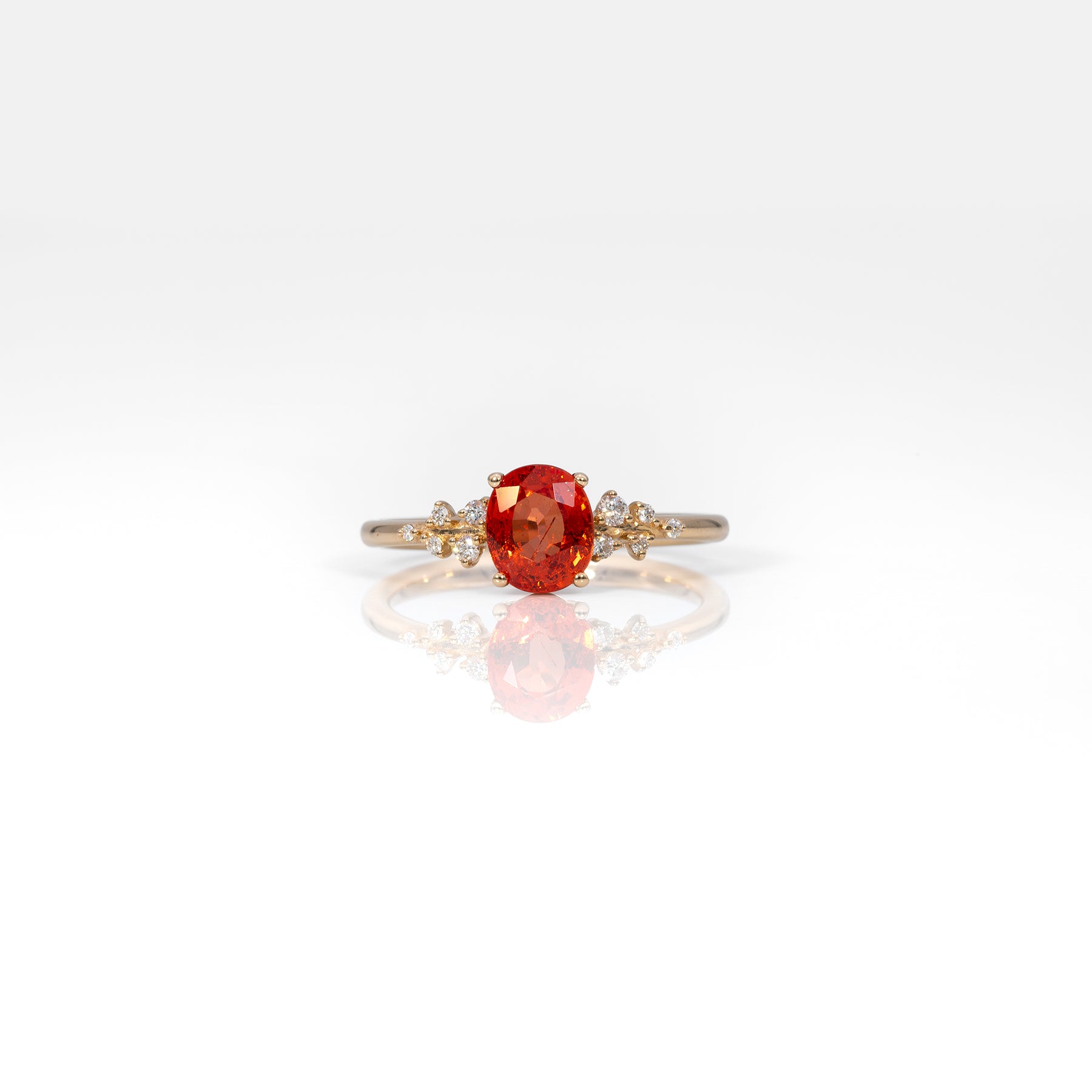 14K yellow gold padparadscha sapphire ring with diamonds