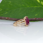 14K yellow gold Madagascar ruby ring with diamond halo