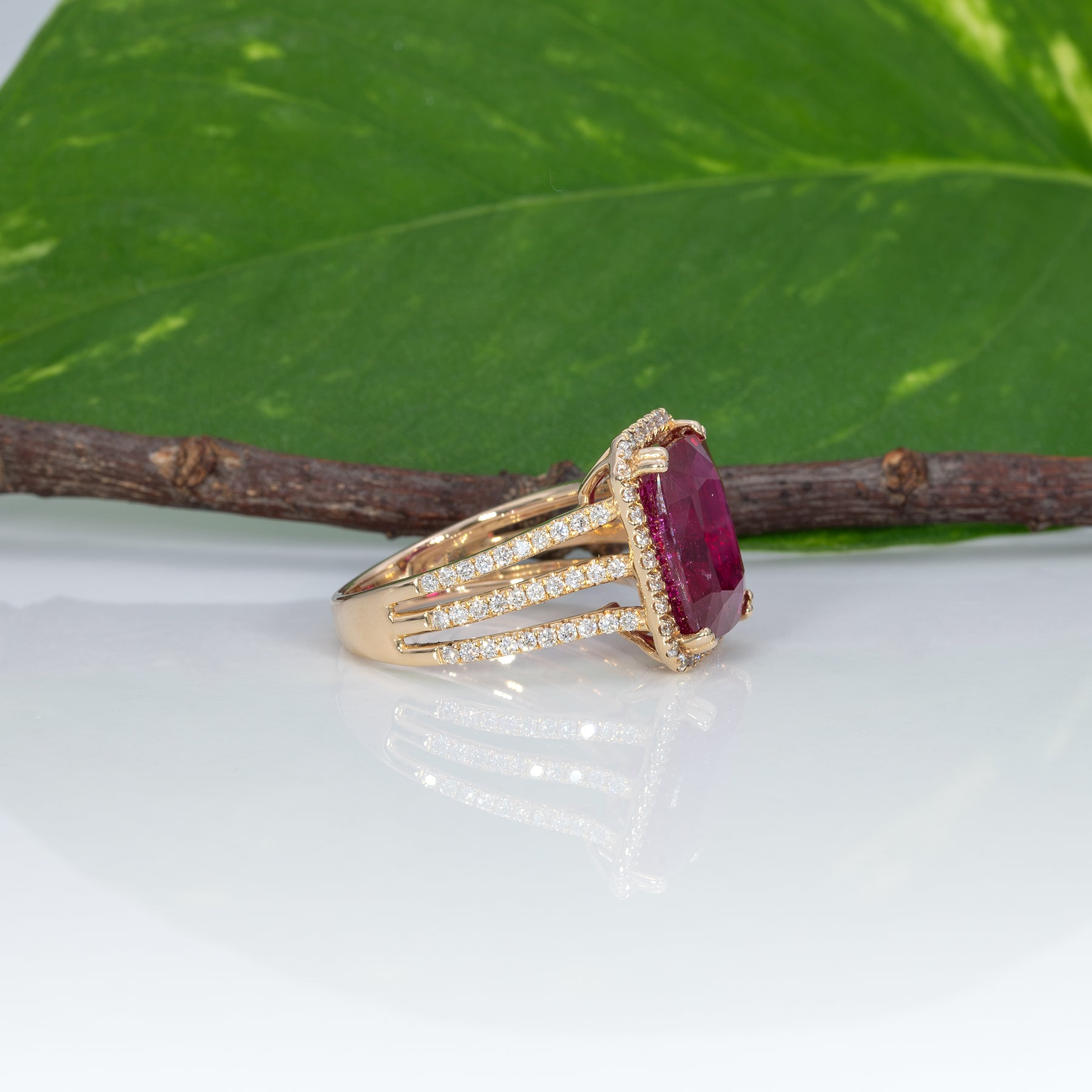 14K yellow gold Madagascar ruby ring with diamond halo