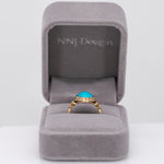 14K yellow gold turquoise cabochon ring with diamond accents