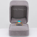 14K yellow gold turquoise cabochon ring with diamond accents