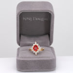 14K yellow gold padparadscha sapphire ring with diamond accents