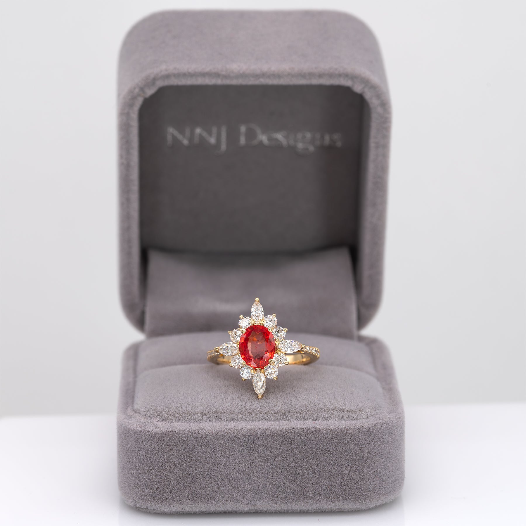 14K yellow gold padparadscha sapphire ring with diamond accents