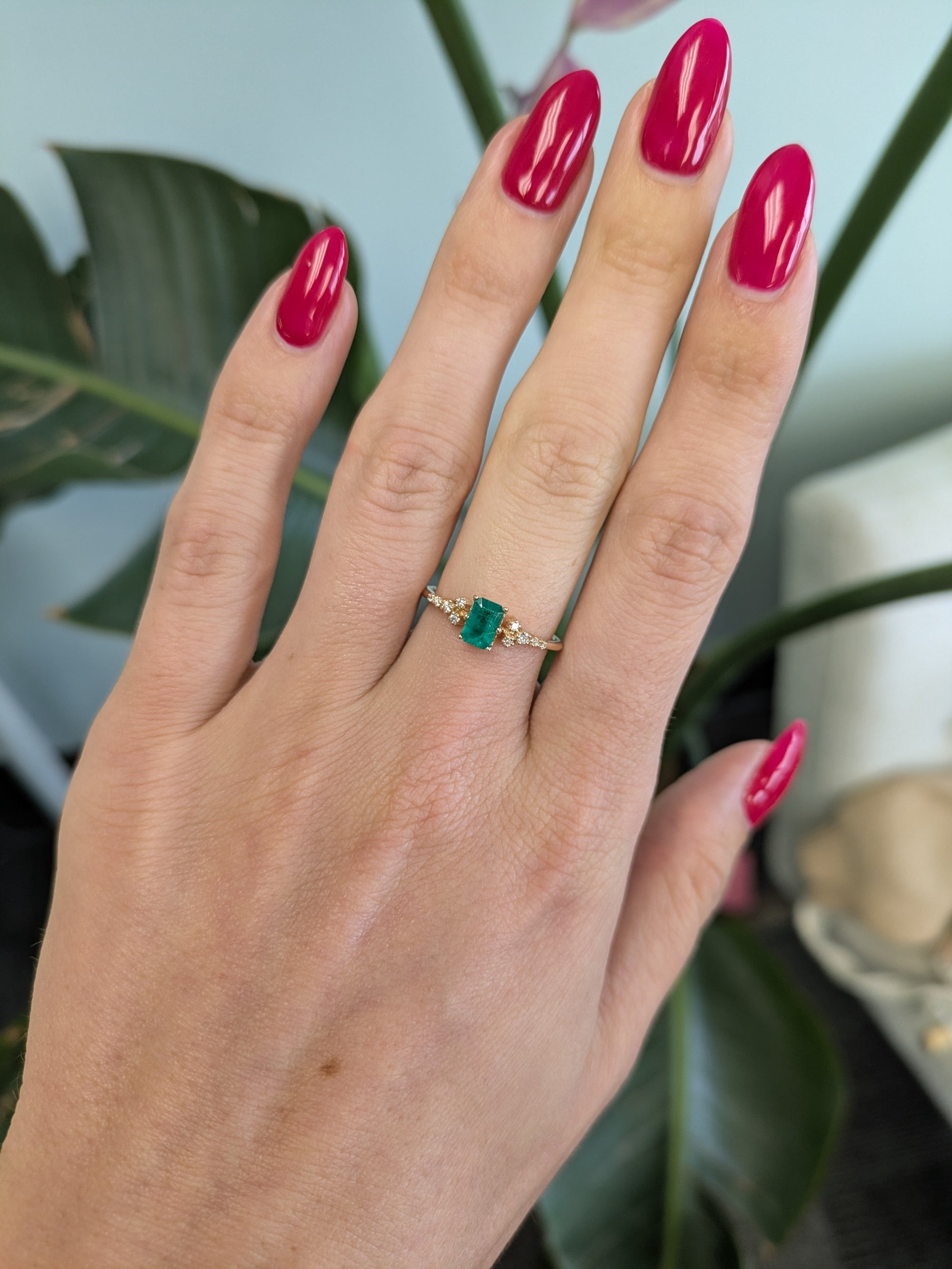 14K yellow gold colombian emerald ring with diamond accents