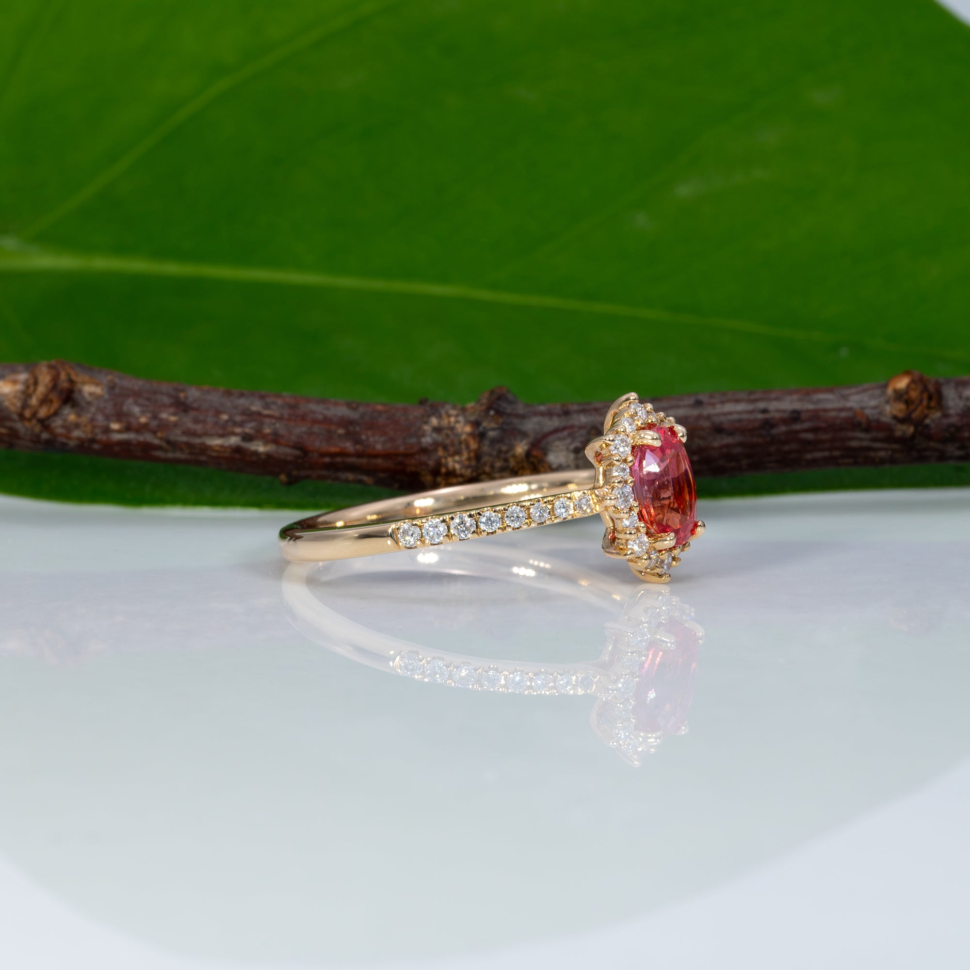 14K yellow gold padparadscha sapphire ring with diamond accents