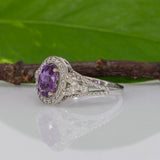 14K white gold pink sapphire oval ring with diamond halo