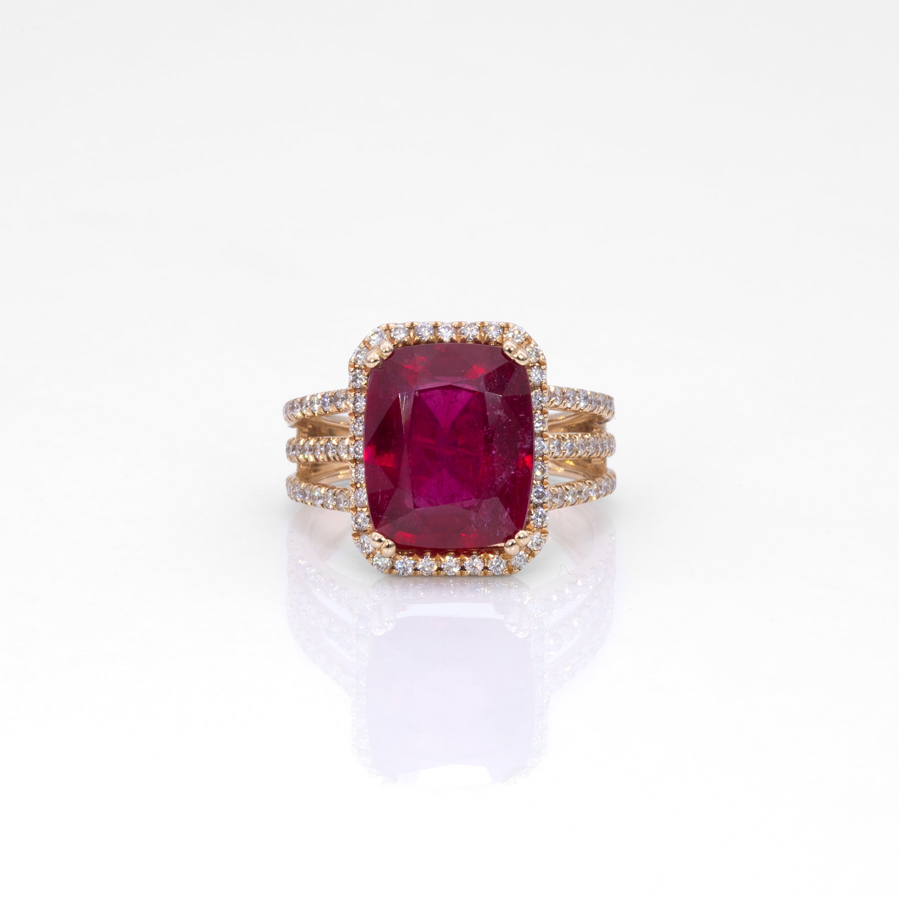 14K yellow gold Madagascar ruby ring with diamond halo