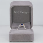 14K white and rose gold tanzanite ring with diamond accents