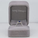 14K white and rose gold tanzanite ring with diamond accents