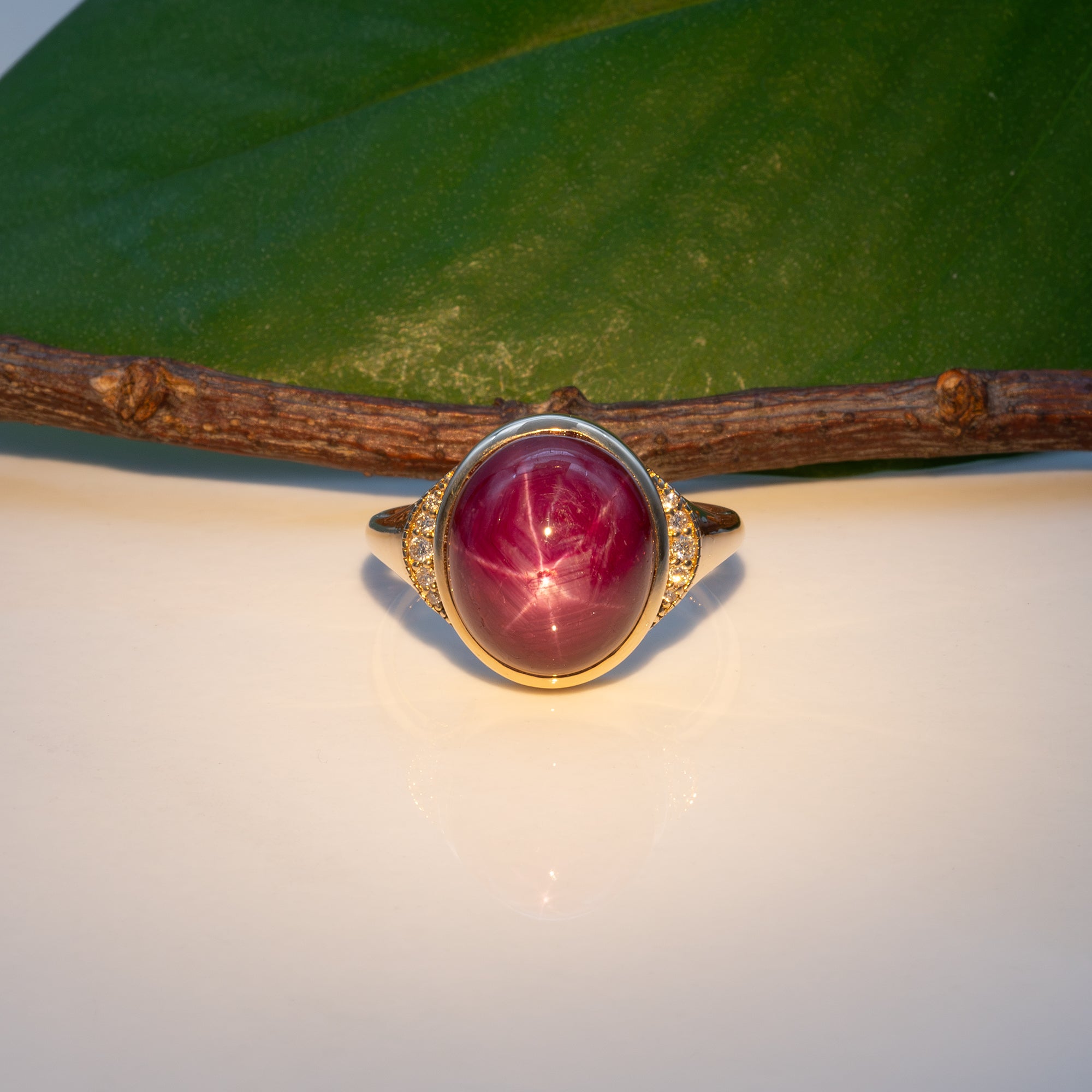 14K yellow gold star ruby cabochon ring with diamond accents