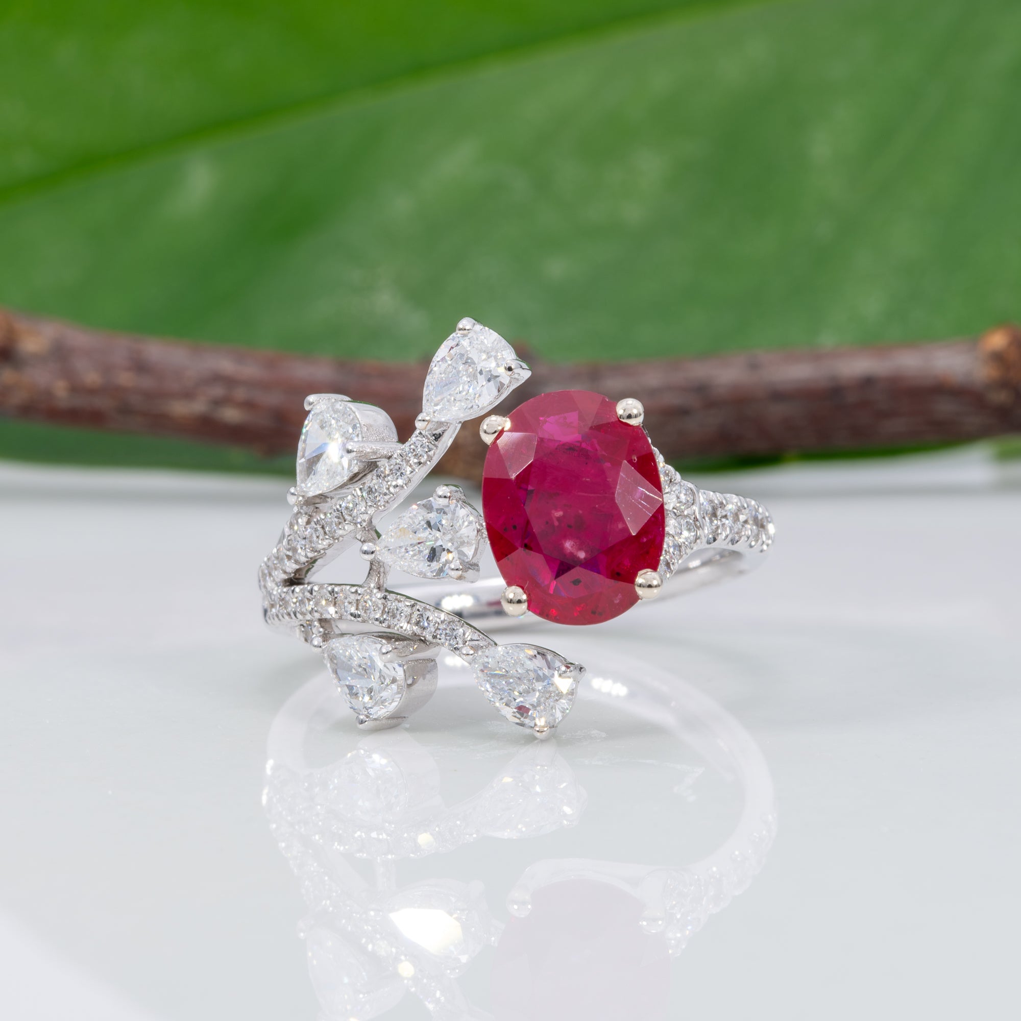 14K white gold mozambique ruby ring with diamond accents