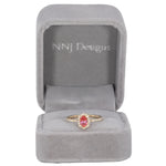 14K yellow gold padparadscha sapphire ring with diamond accents