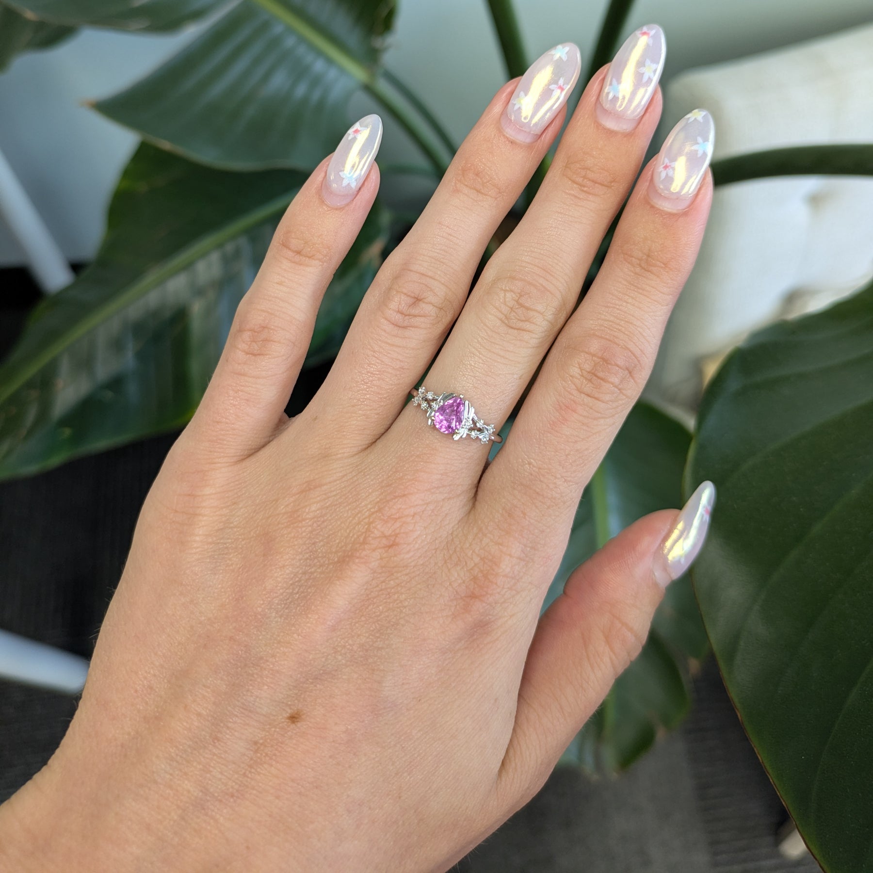 14K white gold pink sapphire pear ring with diamond halo