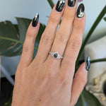 14K white gold pear alexandrite ring with diamond halo
