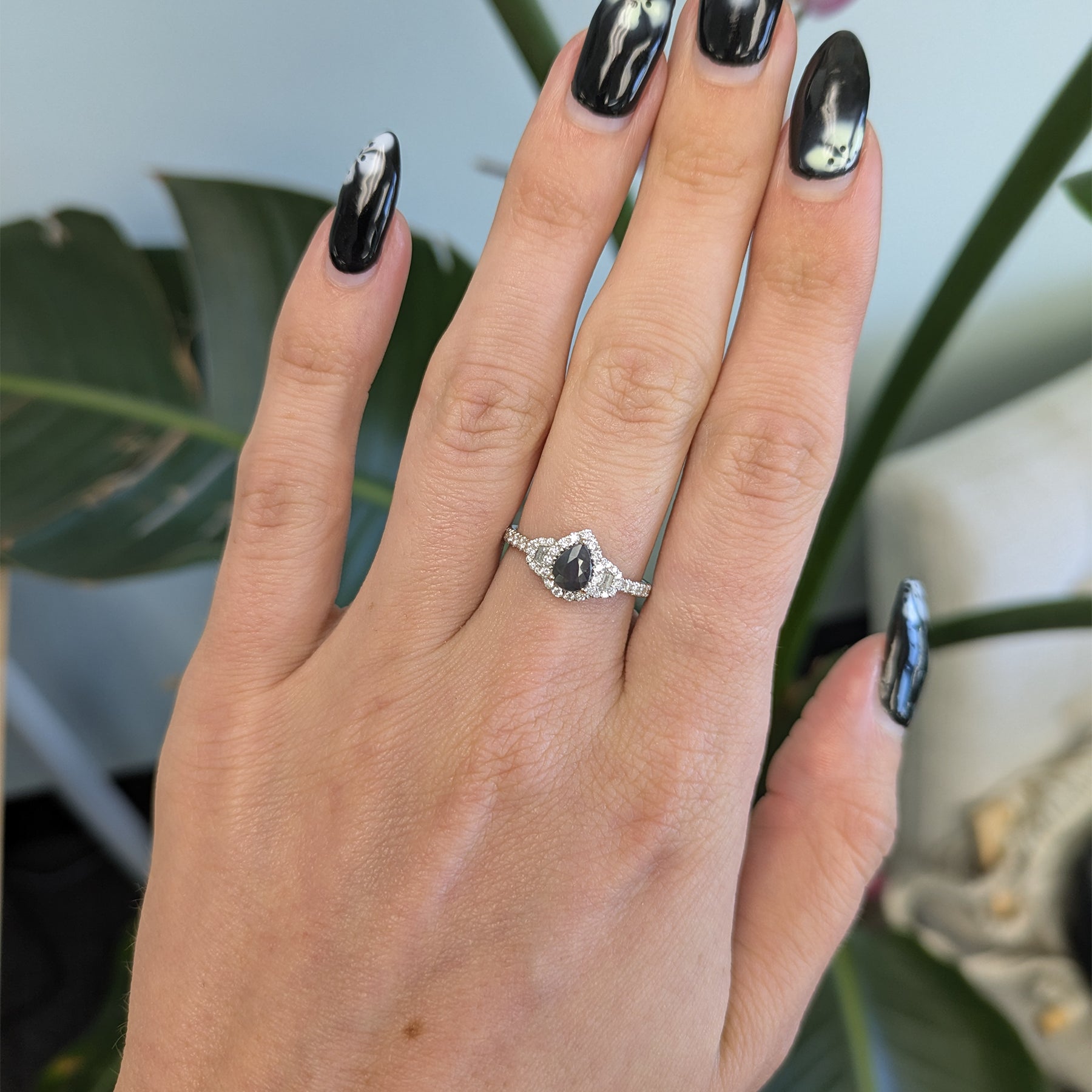 14K white gold pear alexandrite ring with diamond halo