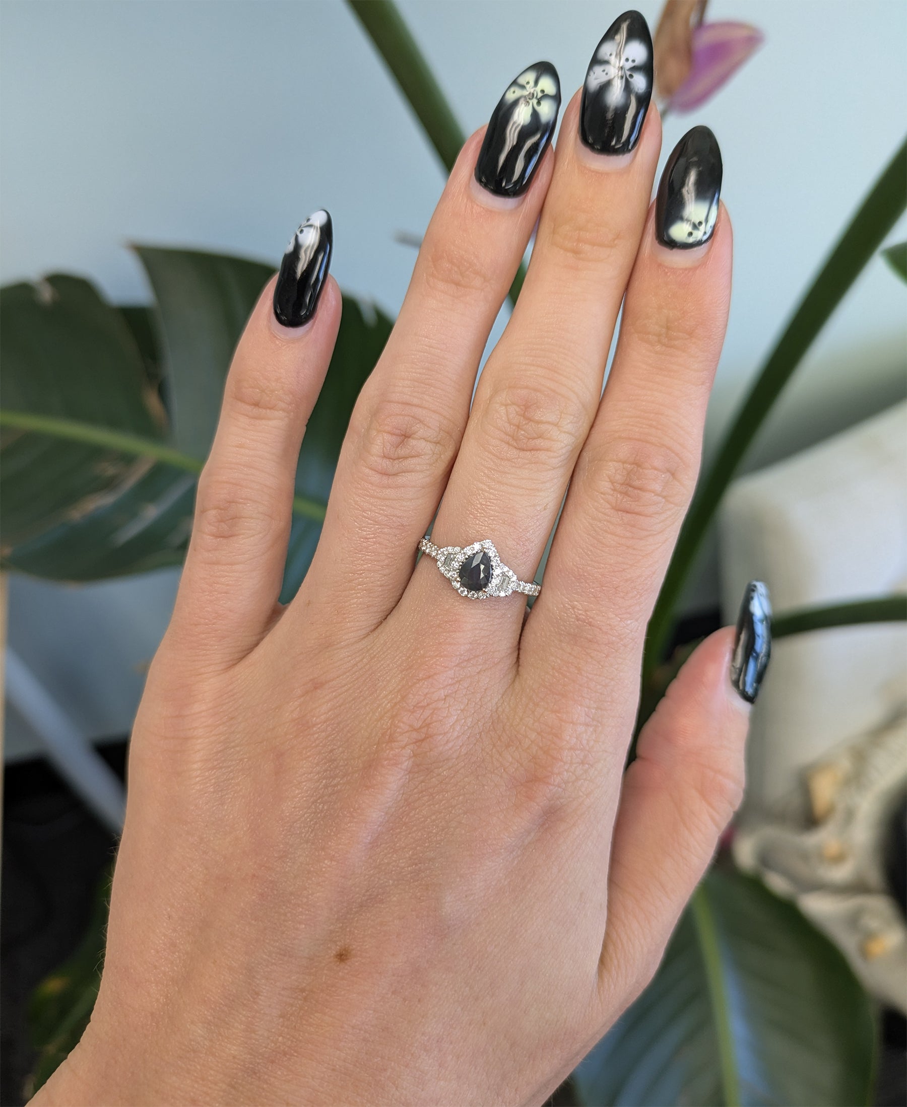 14K white gold pear alexandrite ring with diamond halo