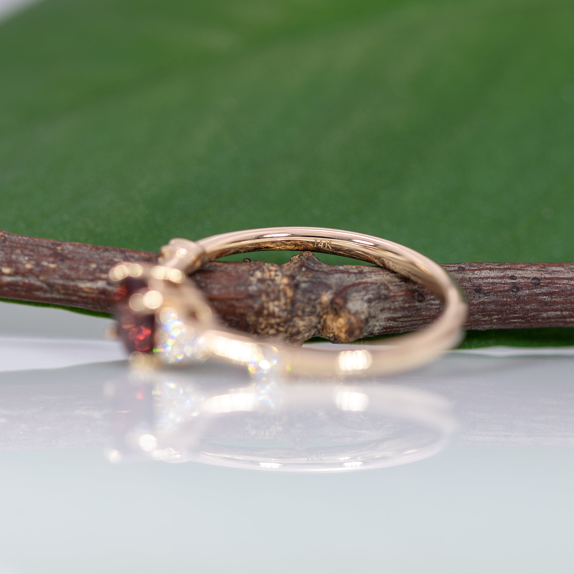 14K yellow gold red spinel ring with diamond accents