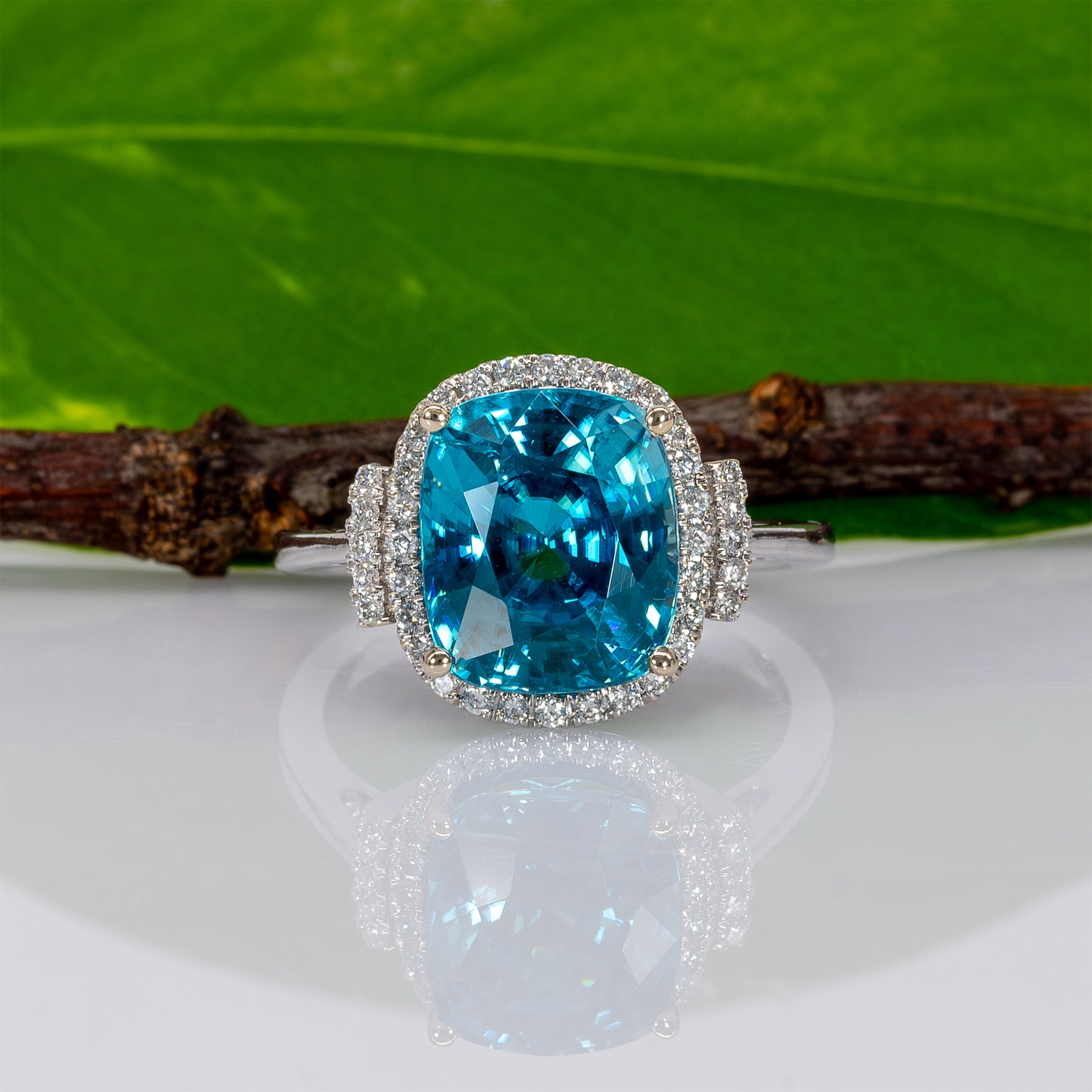 14K white gold Cambodian blue zircon cushion ring with diamond halo