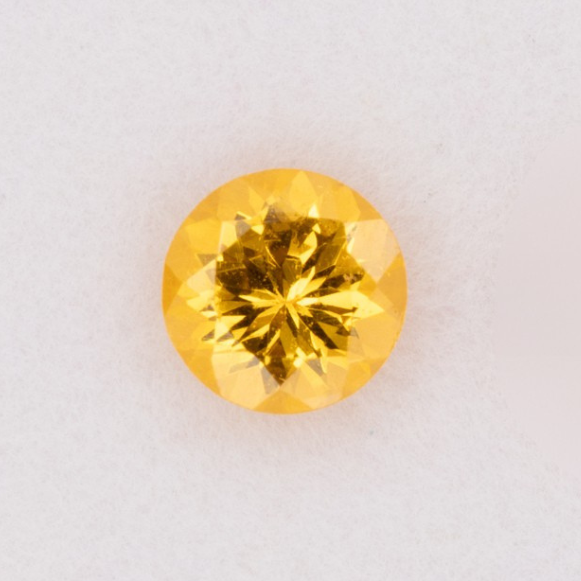 0.59ct Spessartite Garnet round 5mm loose orange gemstone