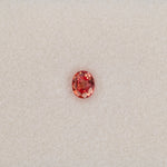 0.55 carat natural padparadscha sapphire, oval 5.1x4.1mm pink-orange loose gemstone