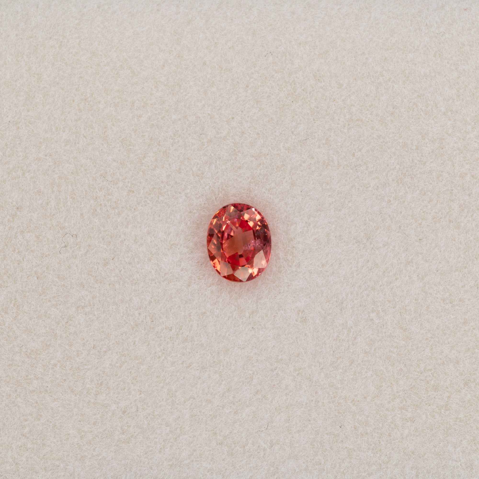 0.55 carat natural padparadscha sapphire, oval 5.1x4.1mm pink-orange loose gemstone