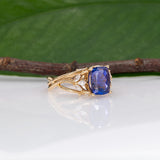 14K yellow gold cushion tanzanite ring with diamond accents
