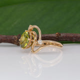 14K yellow gold sphene ring with diamond halo
