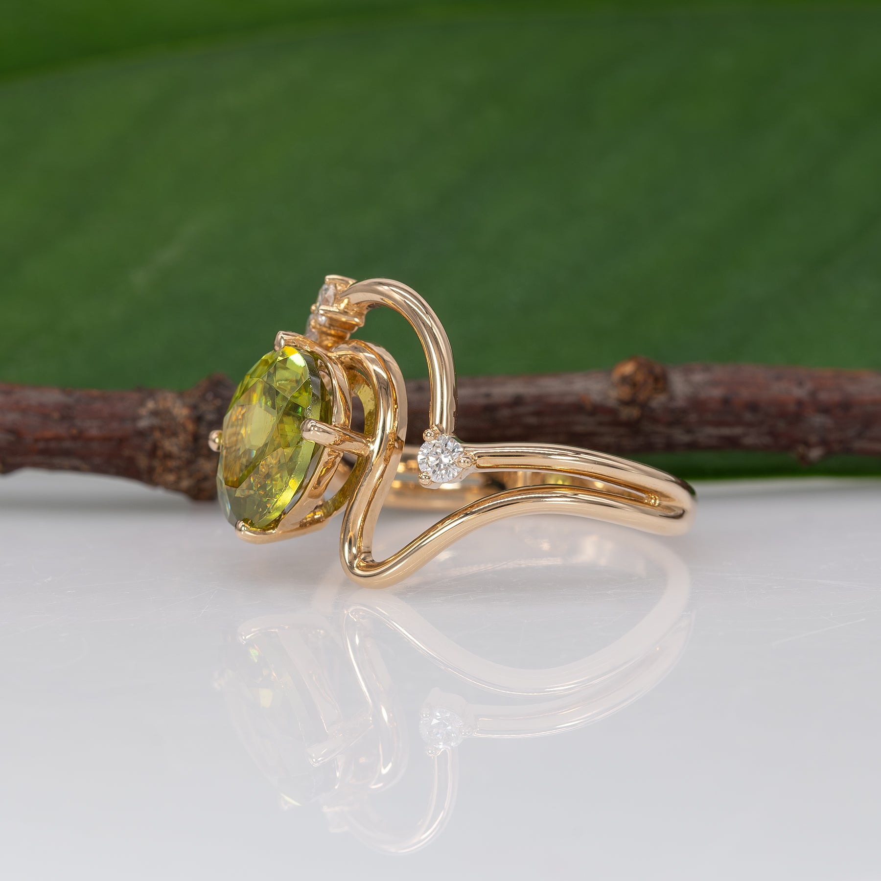14K yellow gold sphene ring with diamond halo