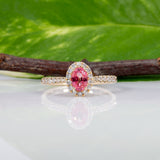 14K yellow gold padparadscha sapphire ring with diamond accents