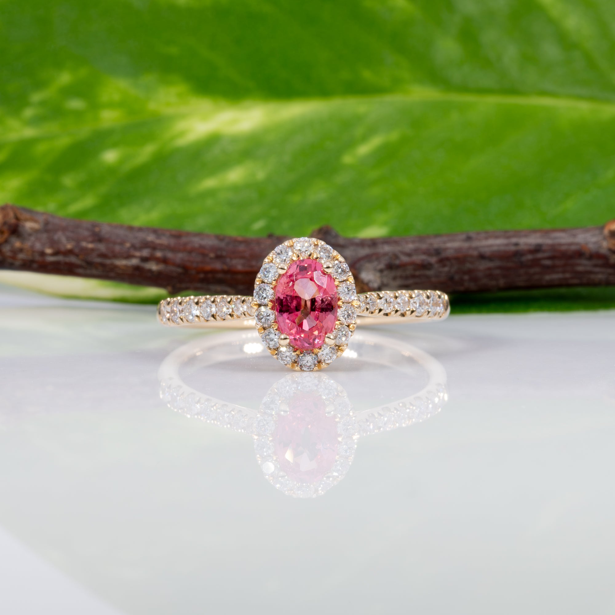 14K yellow gold padparadscha sapphire ring with diamond accents