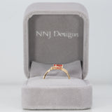 14K yellow gold padparadscha sapphire ring with diamond accents