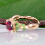 14K yellow gold purple garnet ring with tsavorite accents