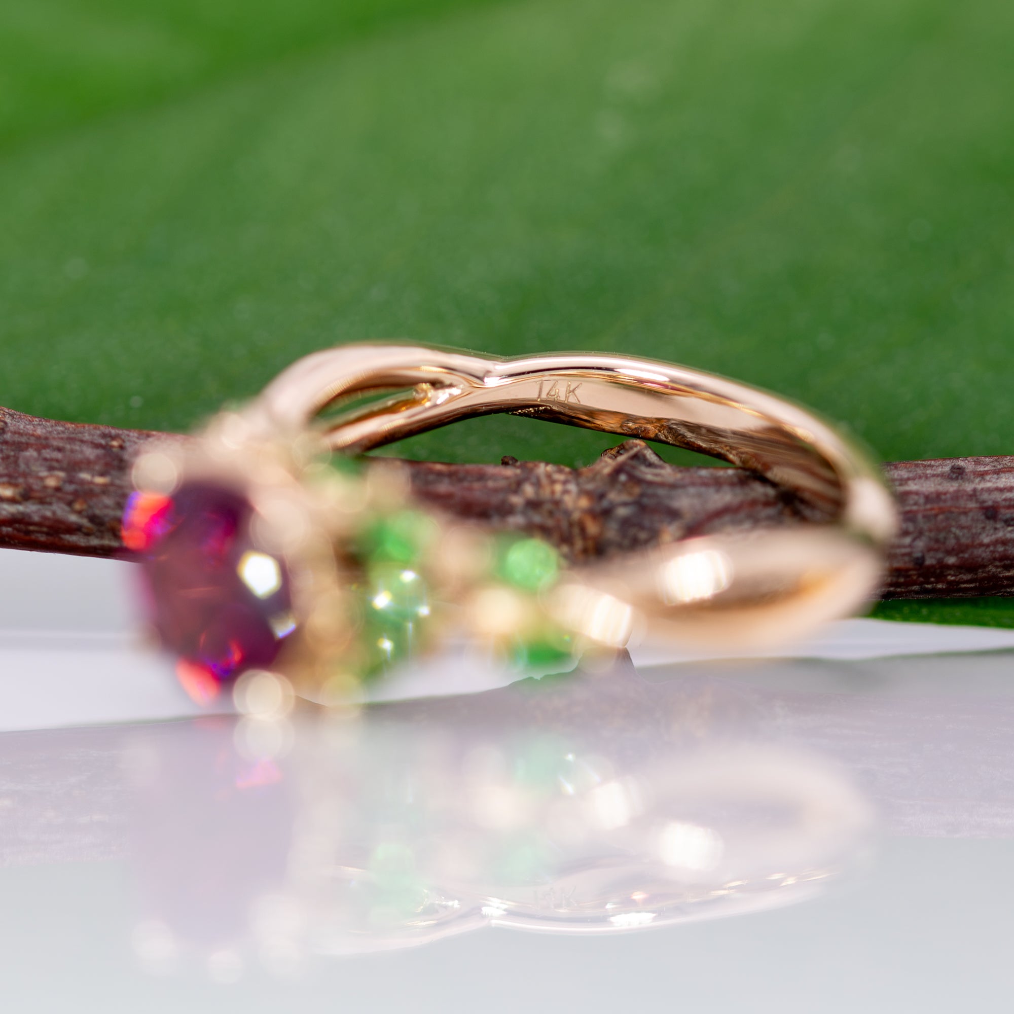 14K yellow gold purple garnet ring with tsavorite accents