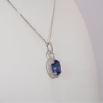 14K white gold tanzanite pendant