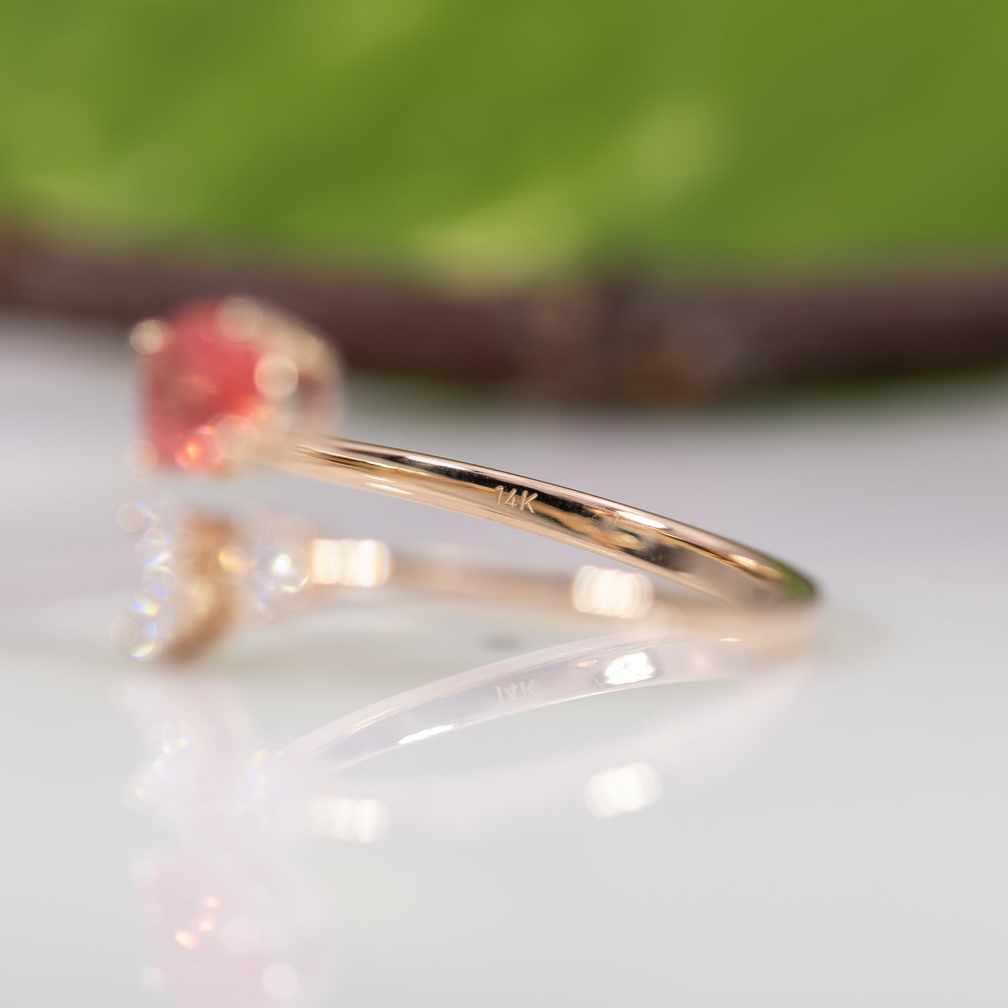 14K yellow gold padparadscha sapphire ring with diamond accents