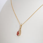 14K yellow gold padparadscha sapphire pendant