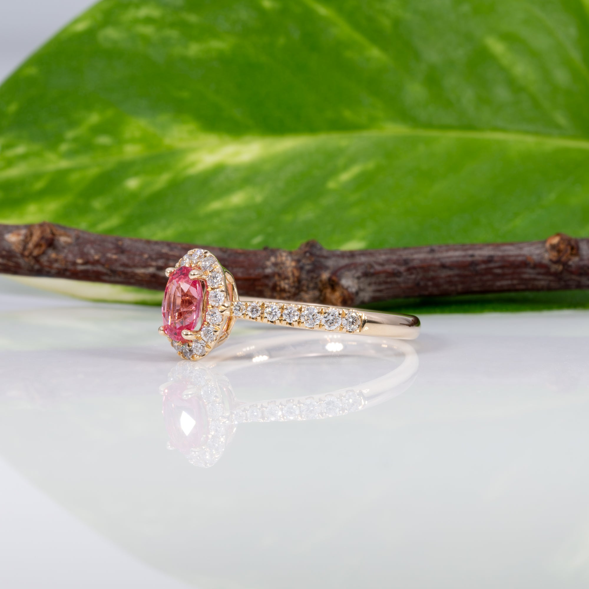 14K yellow gold padparadscha sapphire ring with diamond accents