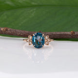 14K rose gold London blue topaz ring with diamond accents