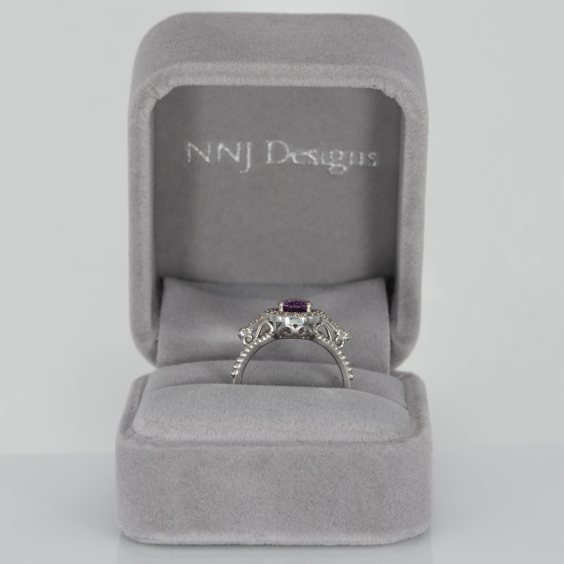 14K white gold pink sapphire oval ring with diamond halo