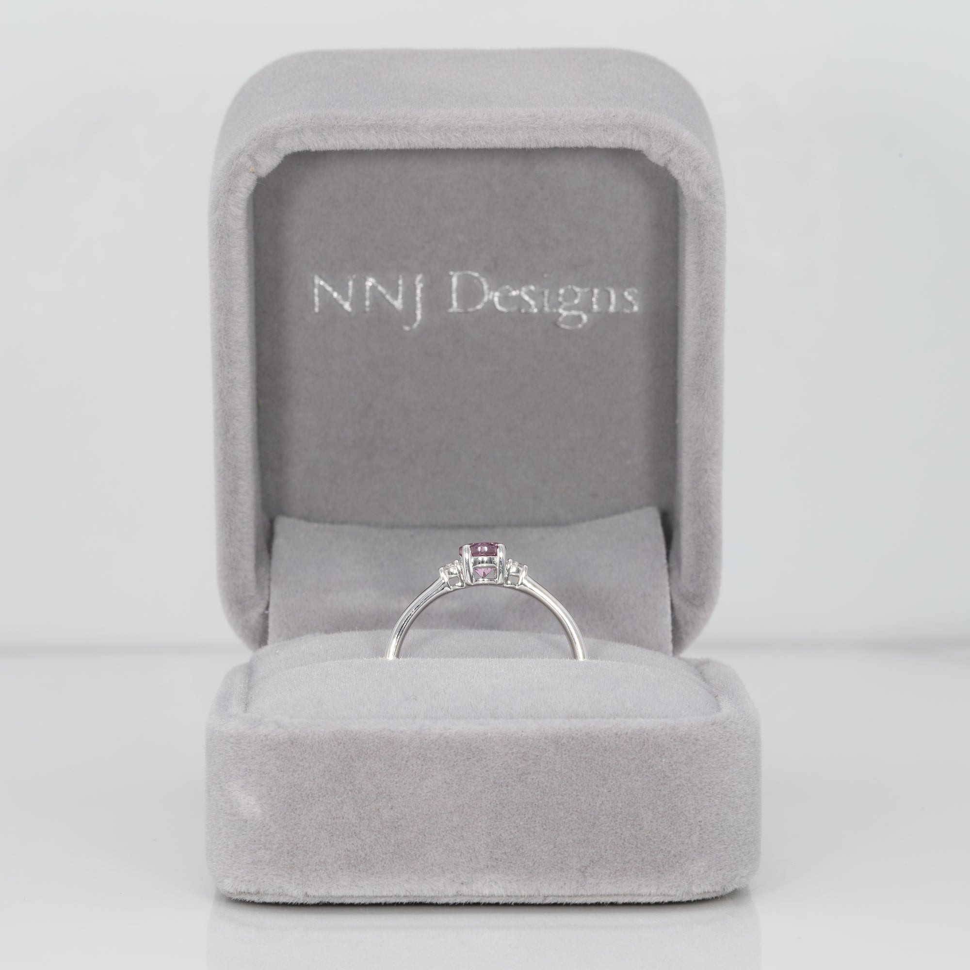 14K white gold minimal purple spinel ring with diamond accents