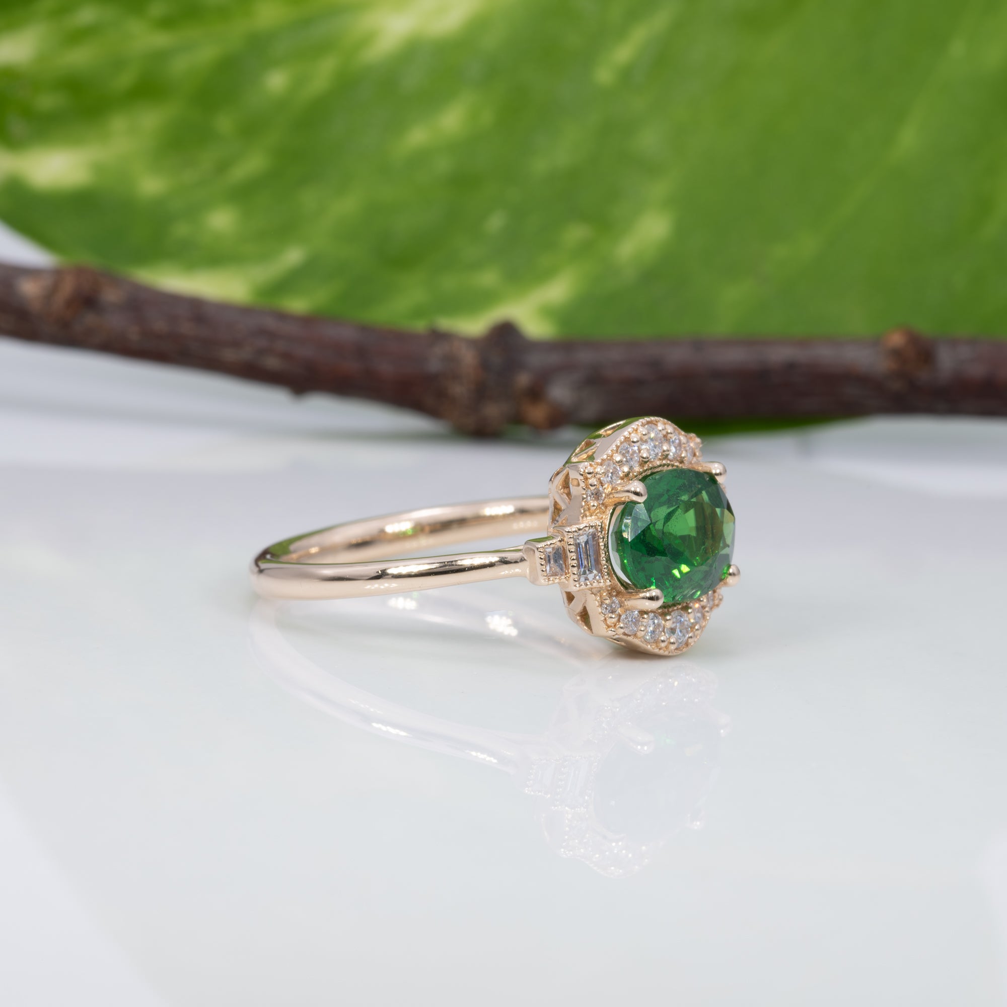 14K yellow gold tsavorite garnet ring with diamond accents