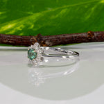 14K white gold alexandrite ring with diamond accents