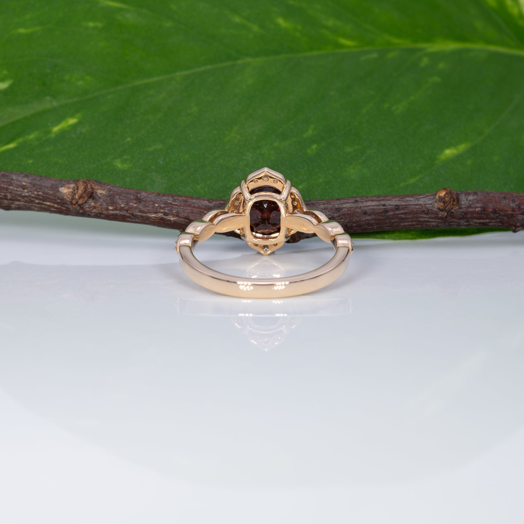 14K yellow gold red spinel ring with diamond accents