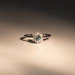 14K white gold alexandrite ring with diamond accents