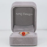 14K yellow gold padparadscha sapphire ring with diamonds