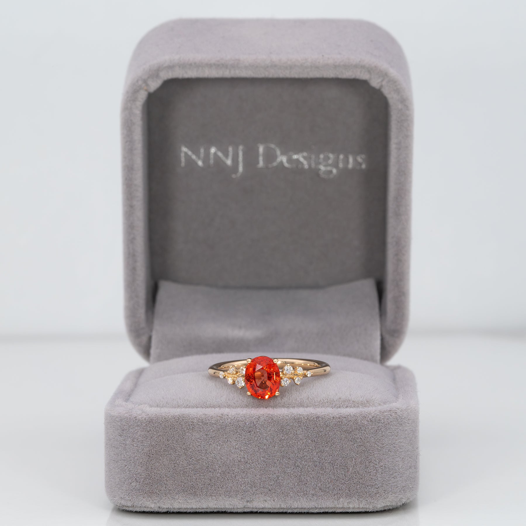 14K yellow gold padparadscha sapphire ring with diamonds