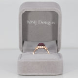 14K rose gold star ruby cabochon ring with diamond accents