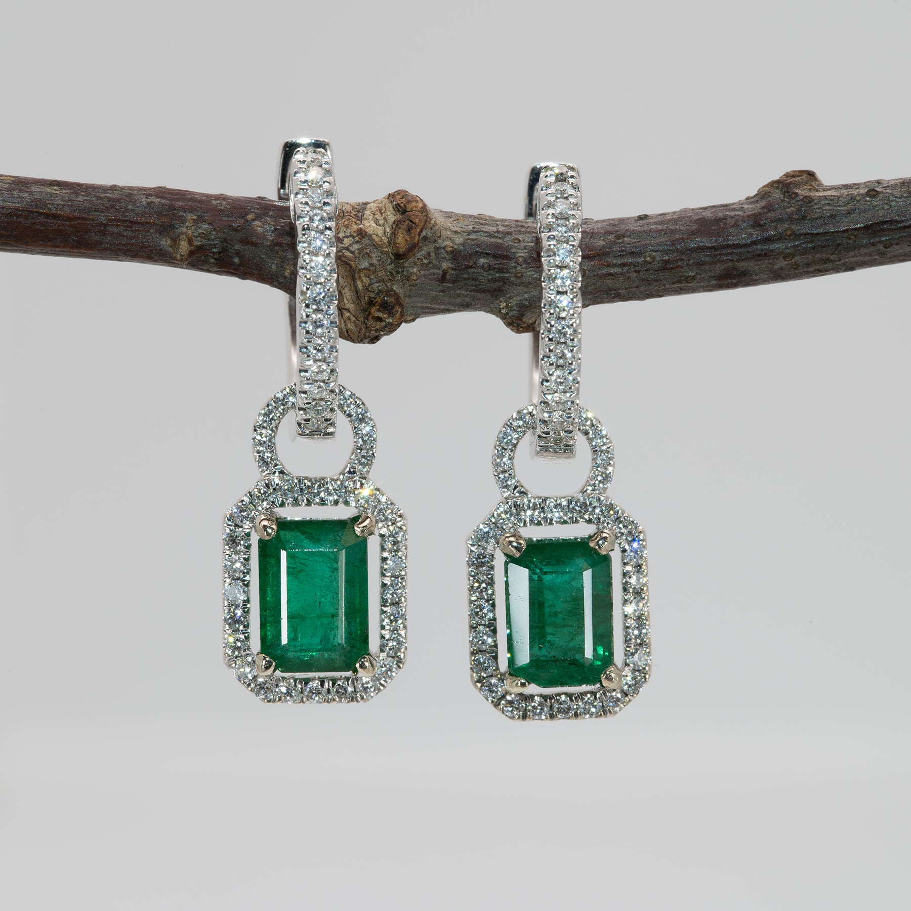 14K white gold Zambian emerald earrings with diamond halos