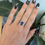 14K white and rose gold tanzanite ring with diamond accents