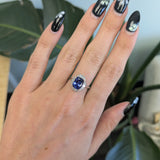 14K white and rose gold tanzanite ring with diamond accents